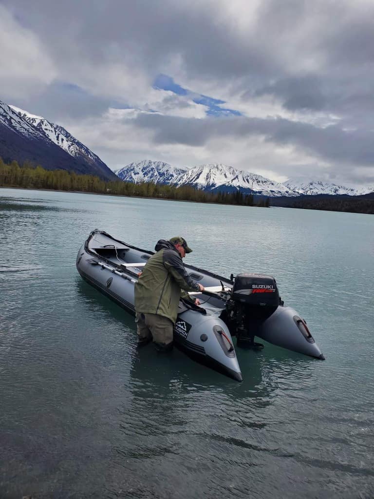 13ft inflatable boat rental with a 9.9HP outboard motor, perfect for a smooth and reliable ride on the water. Ideal for fishing, hunting, or a day of adventure.