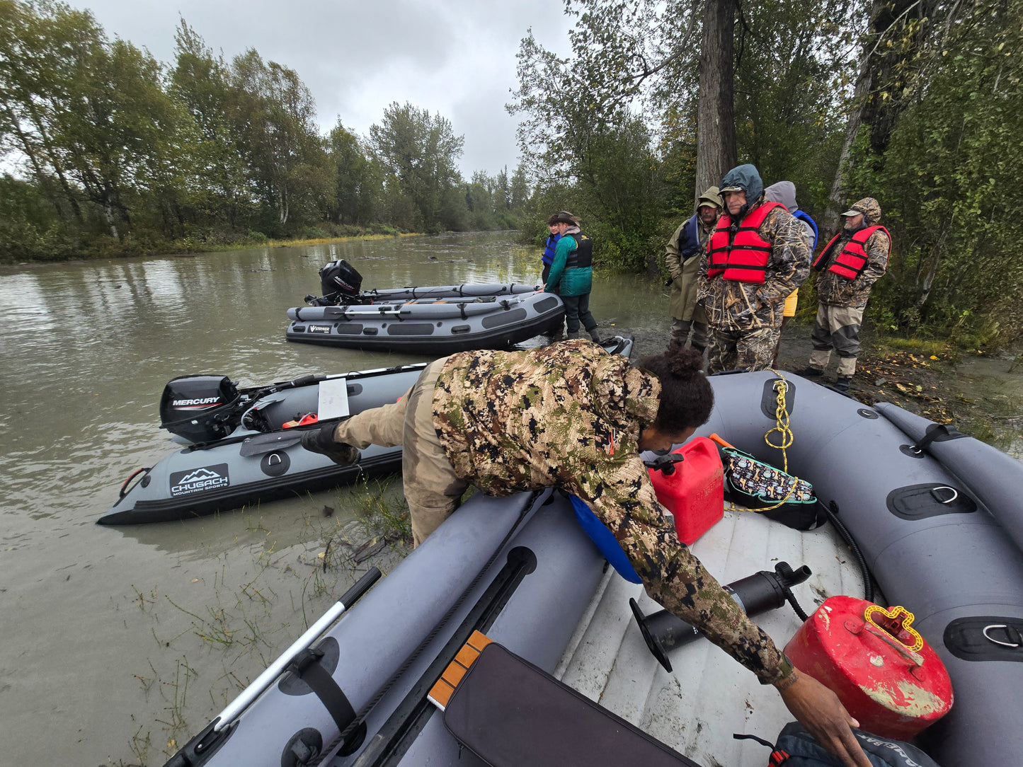 Stryker 420 Inflatable Jet Boat resting on gravel bar along Alaska river — shallow-draft jet boat built for remote backcountry access.