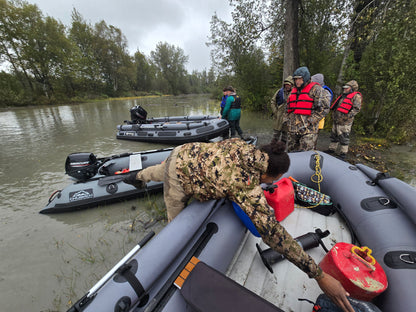 Stryker 420 Inflatable Jet Boat resting on gravel bar along Alaska river — shallow-draft jet boat built for remote backcountry access.