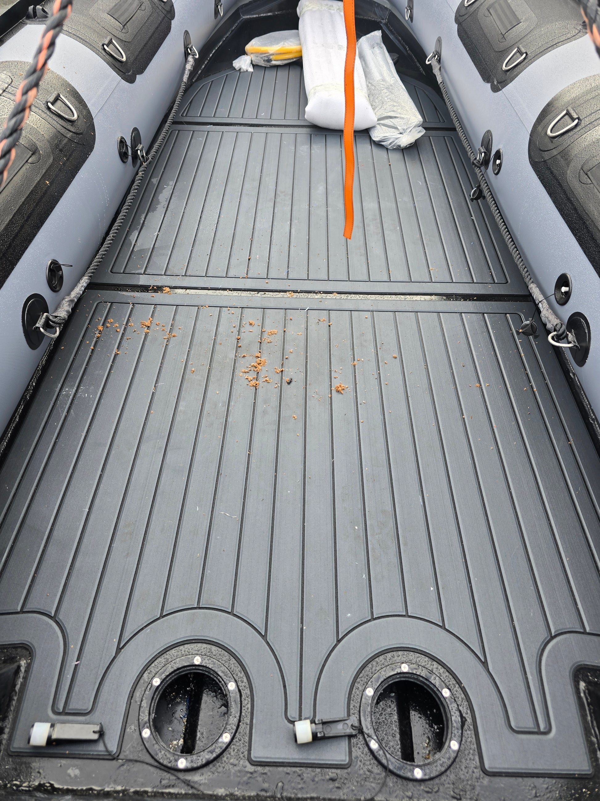 “Inside view of Stryker 420 RIB Jet Tunnel showing rigid aluminum deck — no inflatable flooring, built for strength and stability.