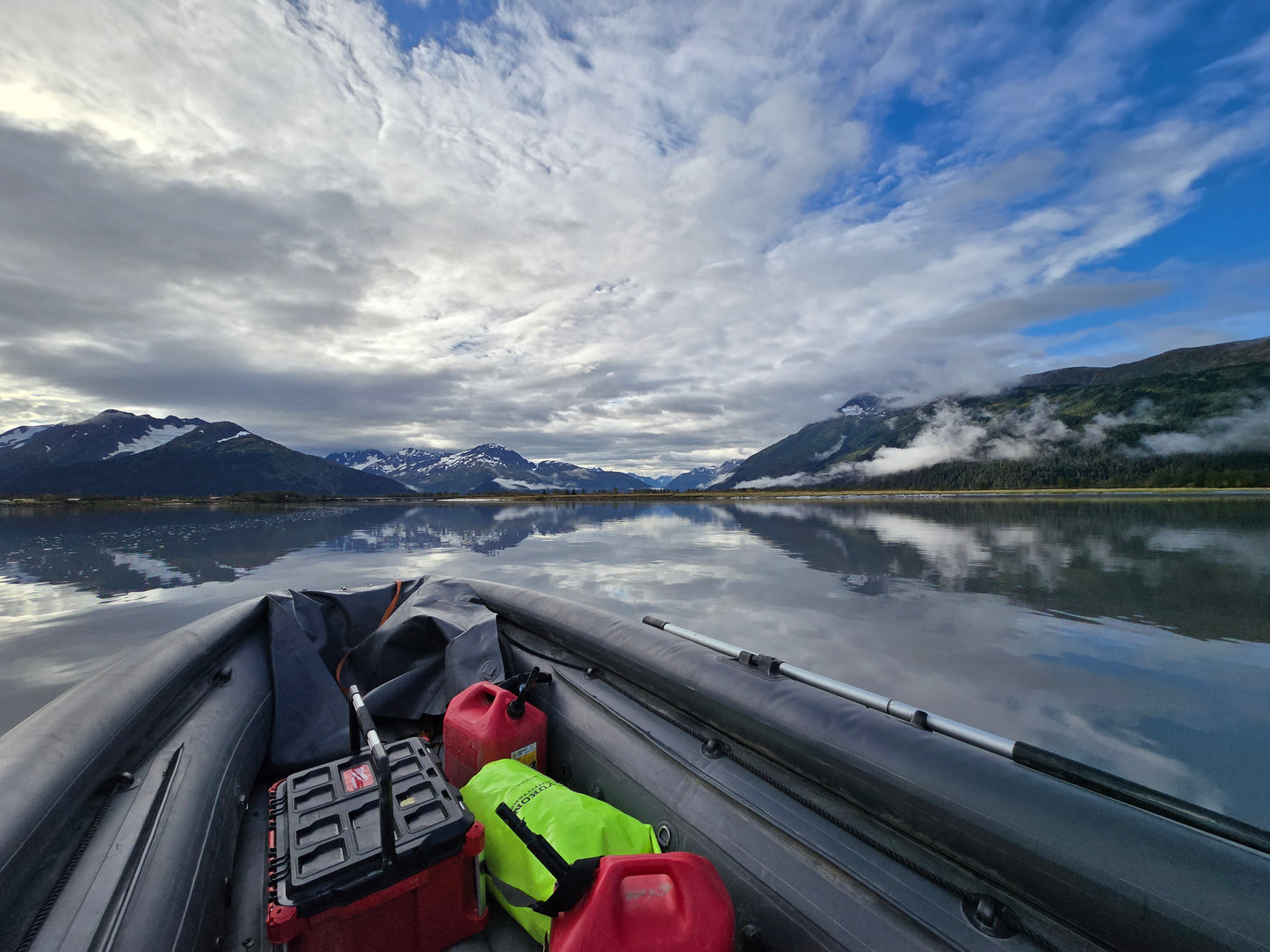 Pro Jet 470 Jet Boat with 50/35 HP Jet Outboard powering upriver through shallow Alaska channels with ease.