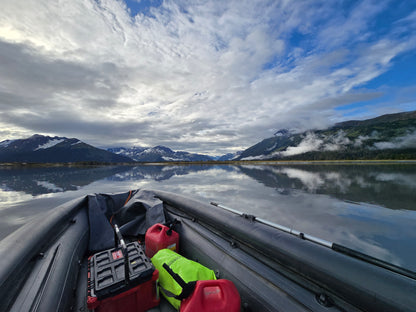 Pro Jet 470 Jet Boat with 50/35 HP Jet Outboard powering upriver through shallow Alaska channels with ease.