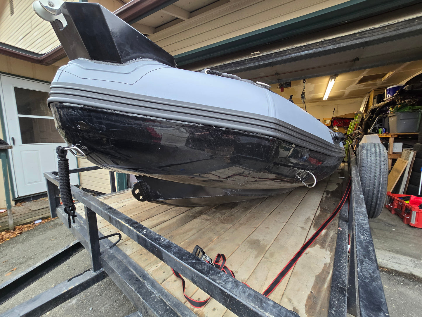 Front angle of Stryker 420 RIB Jet Tunnel highlighting tunnel hull and jet outboard — efficient design for shallow and coastal operation.
