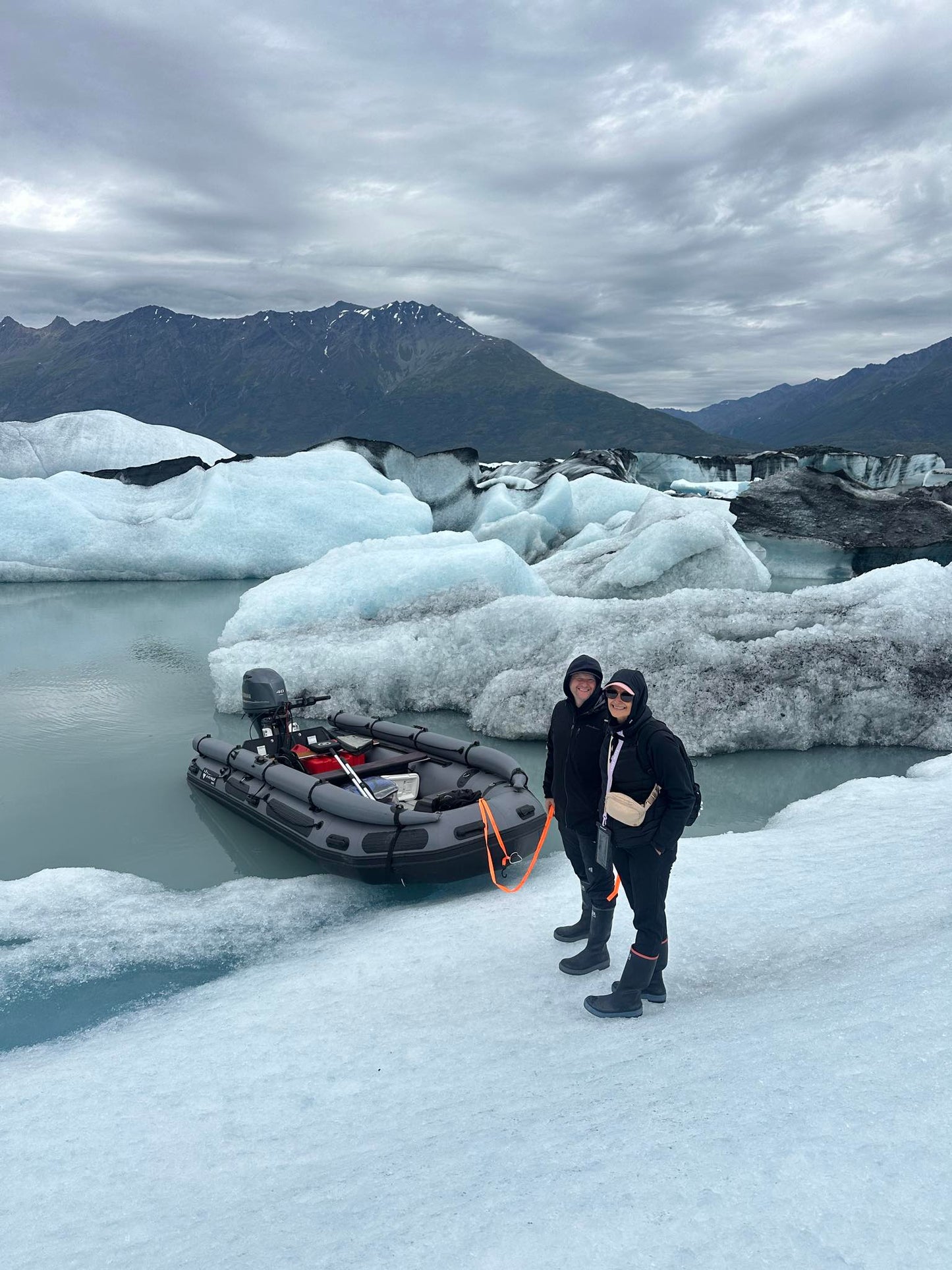 Stryker 470 Inflatable Jet Boat parked near a glacier in Alaska — rugged inflatable built for cold, glacial waters.