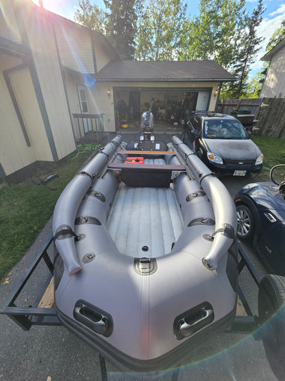 Stryker 470 Inflatable Jet Boat on trailer, showing side profile and durable hull design built for Alaska’s rugged terrain.
