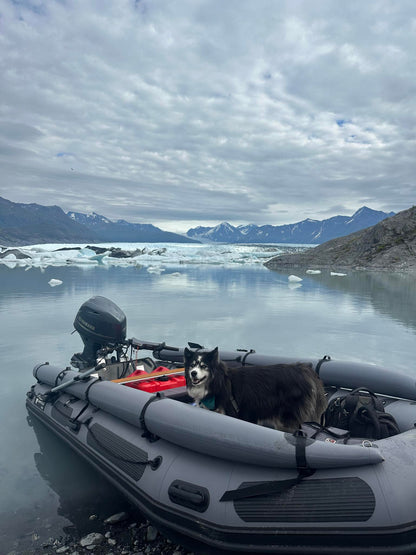 Stryker 470 Inflatable Jet Boat parked near a glacier in Alaska — rugged inflatable built for cold, glacial waters.
