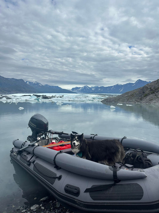 Stryker 470 Inflatable Jet Boat parked near a glacier in Alaska — rugged inflatable built for cold, glacial waters.