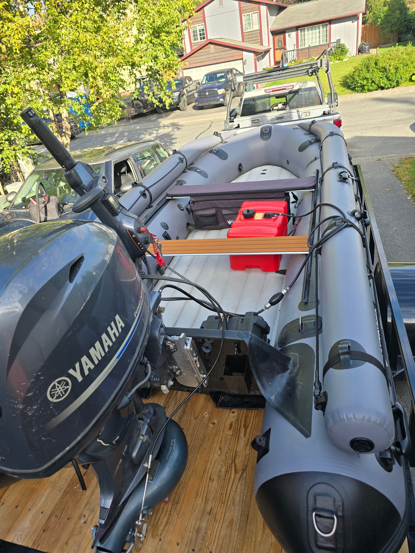 Stryker 470 Jet Boat with outboard mounted on trailer — compact setup for easy hauling to Alaska rivers and boat launches.