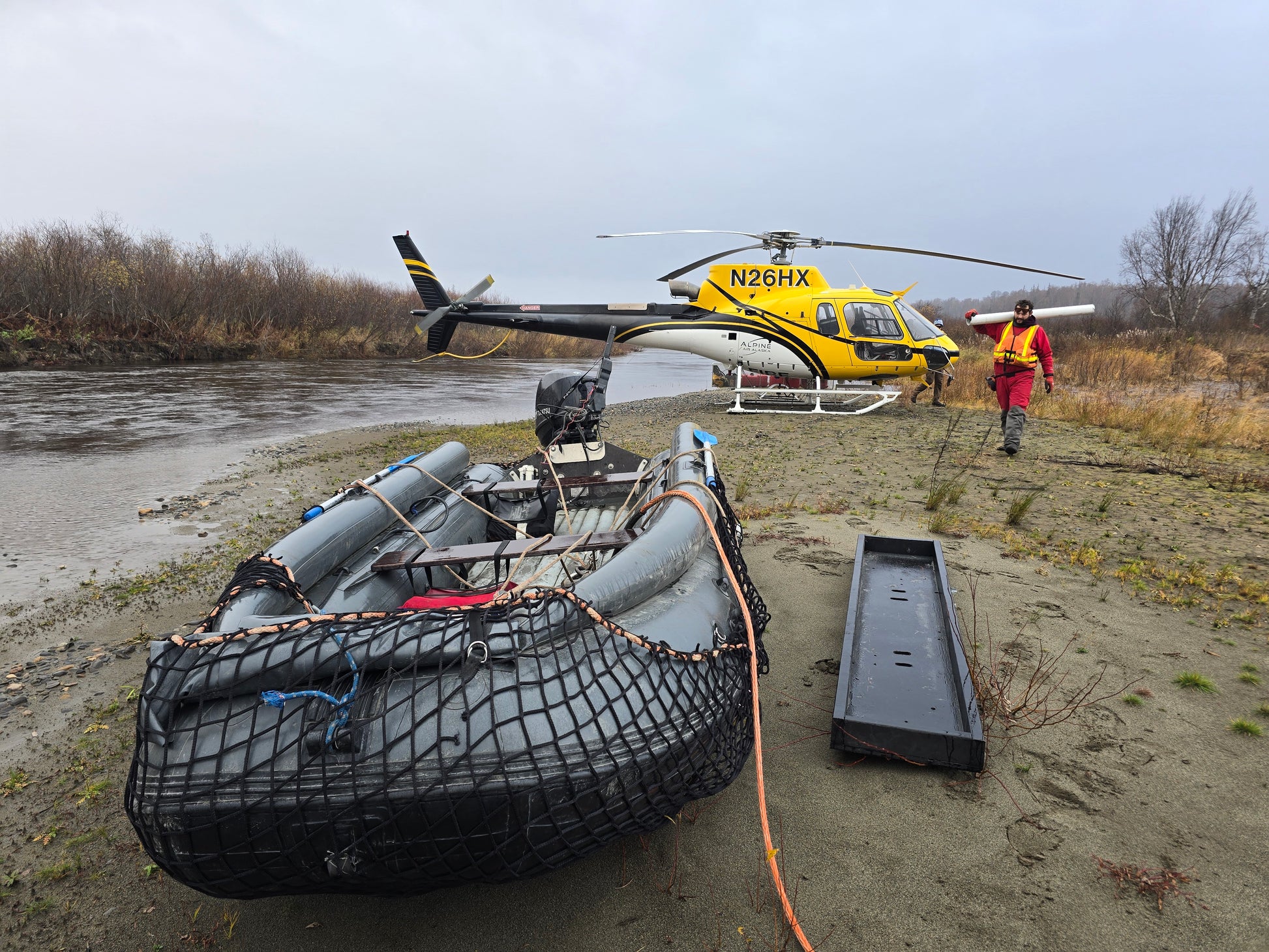 Work crew aboard Pro Jet 470 Jet Boat conducting survey operations on the Susitna River — rugged inflatable suited for commercial projects.