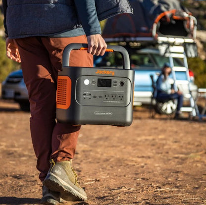 Jackery 1000 Plus Solar Generator running on an inflatable boat during an Alaska river trip for fishing and glacier adventures.