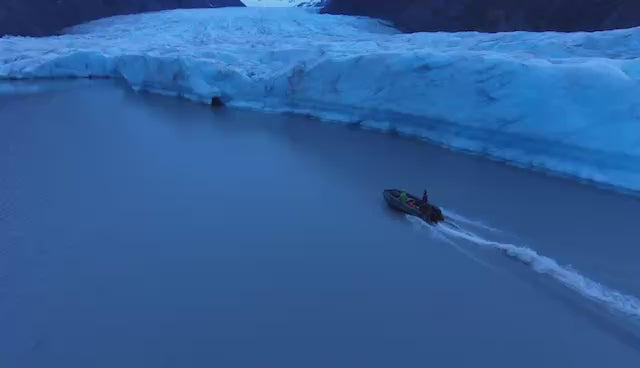 Pro Jet 470 Jet Boat cruising beside Spencer Glacier in Alaska — stable inflatable handling in glacial meltwater conditions.