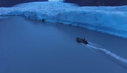 Pro Jet 470 Jet Boat cruising beside Spencer Glacier in Alaska — stable inflatable handling in glacial meltwater conditions.